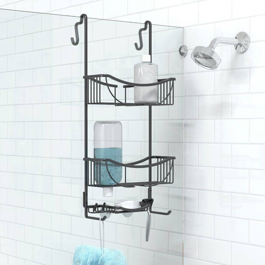 Matte black rust proof aluminium shower caddy hanging over a shower screen