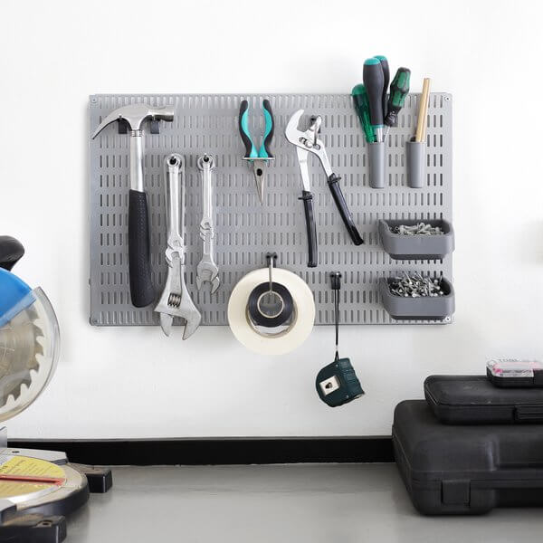 Hammers, tape measures and screws stored on a Platinum Elfa Storing Board