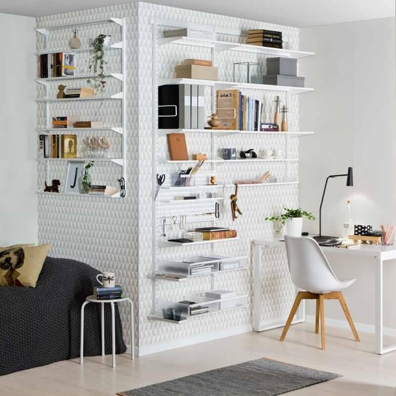 A White Elfa office storage system with Reversible Metal Shelf Trays organising books and stationery